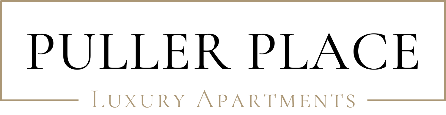 A sign that says "Puller Place Luxury Apartments".